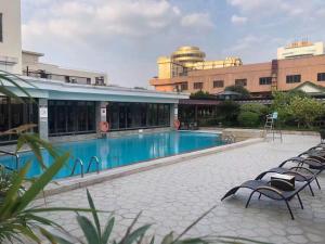 Πισίνα στο ή κοντά στο Zhongshan International Hotel