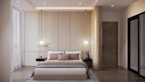 Giường trong phòng chung tại Petit Hotel