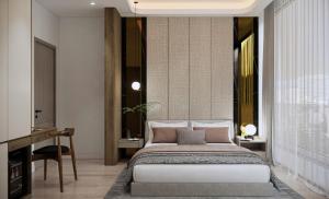 Giường trong phòng chung tại Petit Hotel