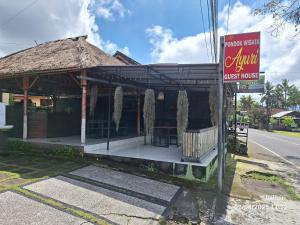 a restaurant on the side of the road at Ayuri Guesthouse in Karangasem