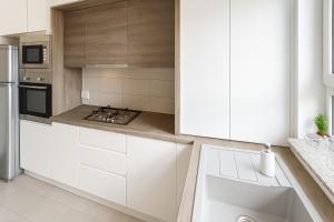 Η κουζίνα ή μικρή κουζίνα στο Ada Homes B69