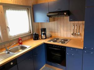 Photo de la galerie de l'établissement Ferienhaus mit Sauna im Ferienpark Mirow, à Granzow