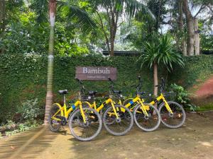 a group of bikes parked next to a sign at Bambuh Boutique Homestay in Ban Den