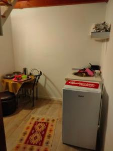 Kuchyň nebo kuchyňský kout v ubytování Apartment M