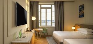 Postel nebo postele na pokoji v ubytování Hyatt Regency Zadar