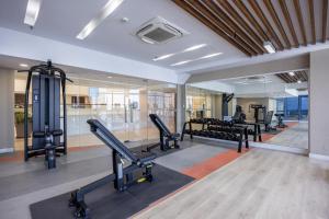 a gym with treadmills and cardio equipment in a building at Virgo Nest Rentals - 38th Park Ave, IT Park Cebu City View in Cebu City