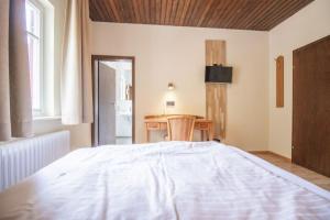 Postel nebo postele na pokoji v ubytování Hotel - Gasthof Blume
