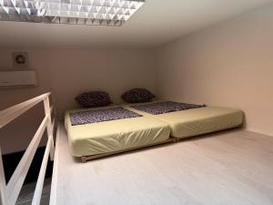 Postel nebo postele na pokoji v ubytování Studio apartman Bišće