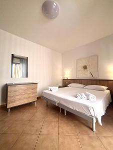 Ένα ή περισσότερα κρεβάτια σε δωμάτιο στο Nura's - Casa Coros