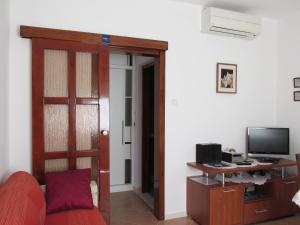 TV a/nebo společenská místnost v ubytování Tower Suites Korcula