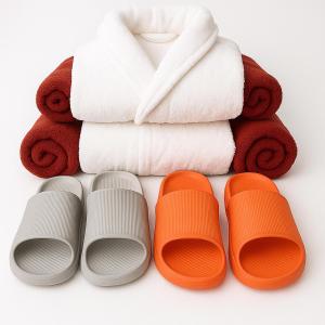 a pile of towels and slippers next to towels at Fantastico 4 - with large private terrace, free parking, air conditioning, BBQ in Puerto de la Cruz