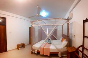 Letto o letti in una camera di Sasagara Beach Villa