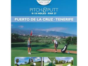 a man and a woman playing golf on a golf course at Fantastico 3 Puerto de la Cruz Tenerife, Free Parking, Air Conditioning, Netflix in Puerto de la Cruz