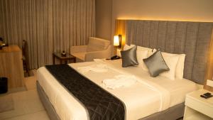 Letto o letti in una camera di Hotel Devdeep Porvorim