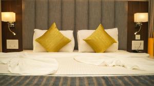 Letto o letti in una camera di Hotel Devdeep Porvorim