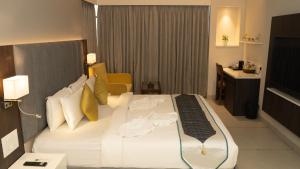 Letto o letti in una camera di Hotel Devdeep Porvorim