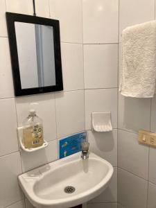 a bathroom with a sink and a mirror at Jardín Aventura in Jardin