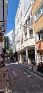 an empty street in a city with buildings at Saygın Beşiktaş in Istanbul