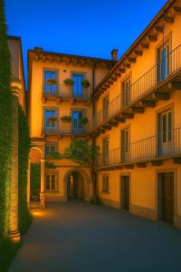 a large building with balconies on the side of it at Borgovivo Il tuo Loft in centro città in Bergamo