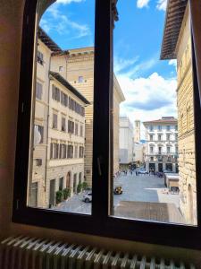 a view from a window of a city street at Luxury apartment in Florence in Florence