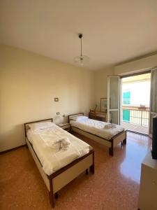 Giường trong phòng chung tại Casa Elisa +27 ảnh