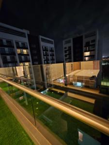 a view of a city at night with buildings at C7 Haven Artesano in Nairobi +36 photos