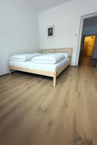 Postel nebo postele na pokoji v ubytování Apartment Rožnov - Rožnov pod Radhoštěm