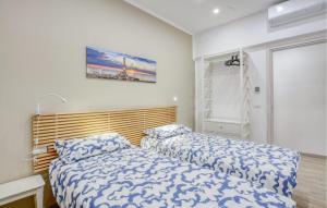 Postel nebo postele na pokoji v ubytování La Luce Sul Molo