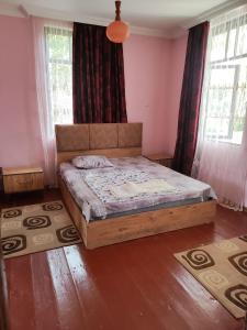 Postel nebo postele na pokoji v ubytování Guest house lia