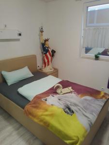 Giường trong phòng chung tại Sauerland Holiday House