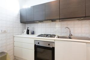 Una cocina o zona de cocina en Dream House Fiumicino