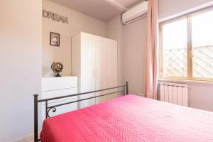 Cama o camas de una habitación en Dream House Fiumicino