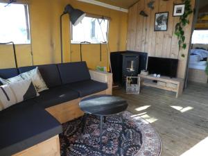Μια τηλεόραση ή/και κέντρο ψυχαγωγίας στο Zorgcamping De Ruif De Peppelhoeve