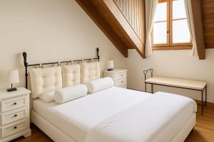 Ένα ή περισσότερα κρεβάτια σε δωμάτιο στο Apartamento Duplex Esterri ideal para familias