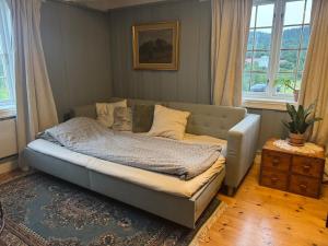 Postel nebo postele na pokoji v ubytování Farm stay at Løkka farm