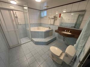 Et badeværelse på 晶想汽車旅館 + 38 billeder