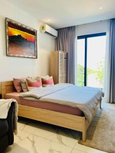 Postel nebo postele na pokoji v ubytování Luxury Suite at Cantonments + 10 fotografií
