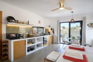 Η κουζίνα ή μικρή κουζίνα στο Casa del Aljibe - El Estudio +11 φωτογραφίες