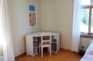a desk with a chair in a room at Room2B in Bergen