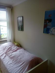 Ένα ή περισσότερα κρεβάτια σε δωμάτιο στο Room2B