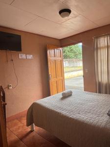 Кровать или кровати в номере Cabinas Santa María