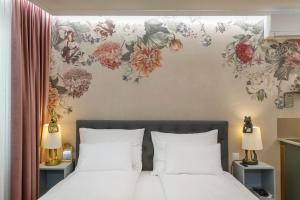 Postel nebo postele na pokoji v ubytování Vienna Hideaways - Boutique Stay with Secret Courtyard Access