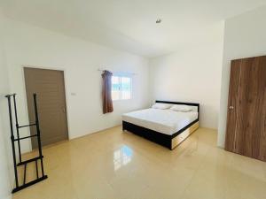 Ένα ή περισσότερα κρεβάτια σε δωμάτιο στο Winlee house