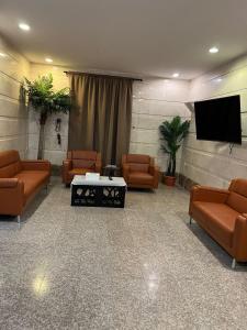 TV a/nebo společenská místnost v ubytování REST inn HOTEL 2