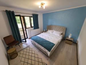 Postel nebo postele na pokoji v ubytování Evernest