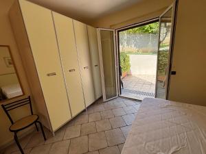 Ένα ή περισσότερα κρεβάτια σε δωμάτιο στο Residence IL BORGO 36