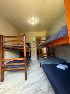 Ένα ή περισσότερα κρεβάτια σε δωμάτιο στο Hostel Big Ben +49 φωτογραφίες