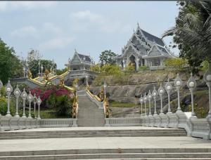 a stairway leading up to a building with a building at Saran Hotel krabi Thailand in Krabi