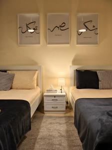 Letto o letti in una camera di TheGrid-HomeStay