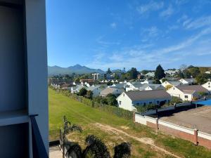 a view of a residential neighborhood with houses at 211 The Meadows in George